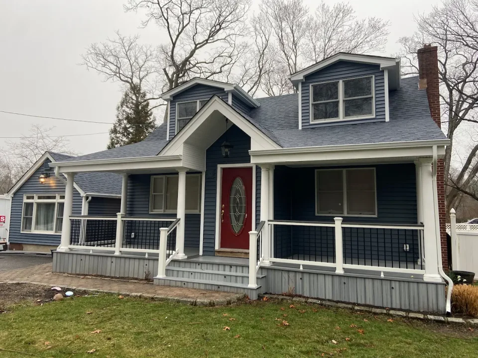 new vinyl siding and porch and portico
