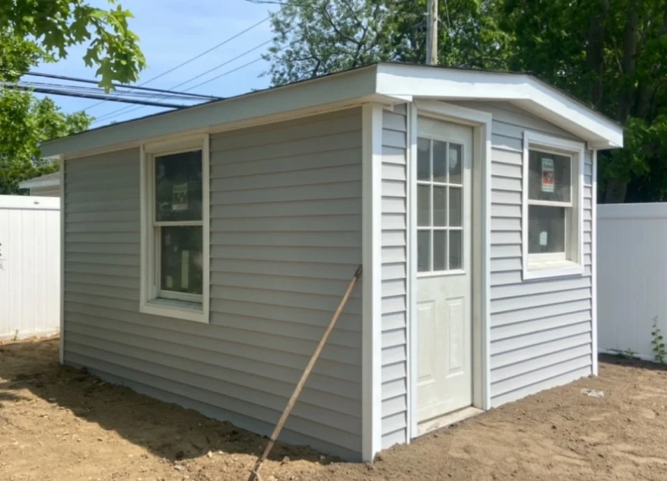 backyard shed new vinyl siding