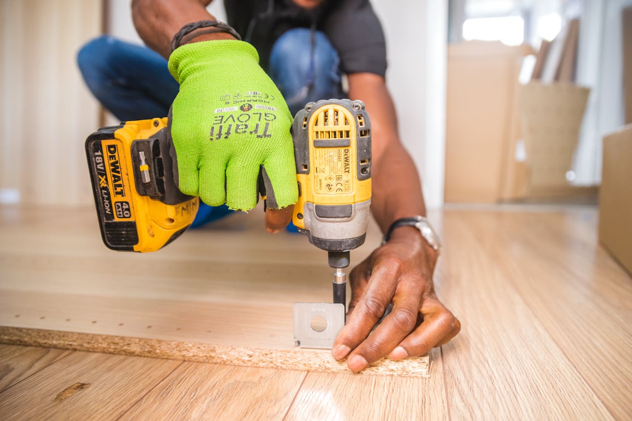 contractor with drill working